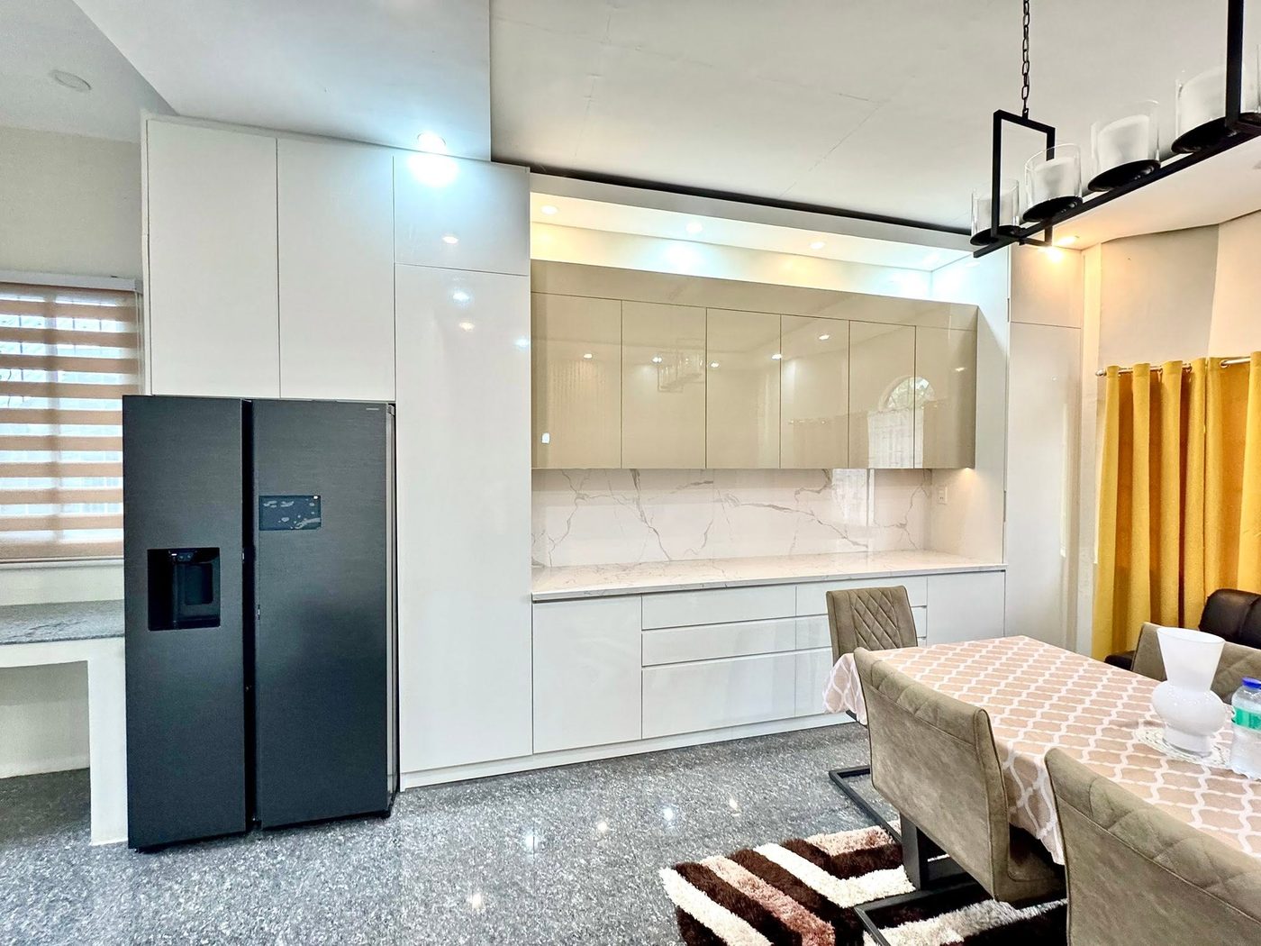 Full-height white kitchen with latte gloss upper cabinets